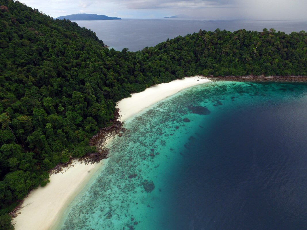Mergui Archipelago: a cluster of lush, green islands surrounded by the clear, blue waters off Myanmar’s southern coast