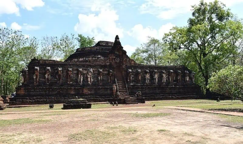 Ancient laterite ruins of Wat Chang Rob temple in Kamphaeng Phet Historical Park